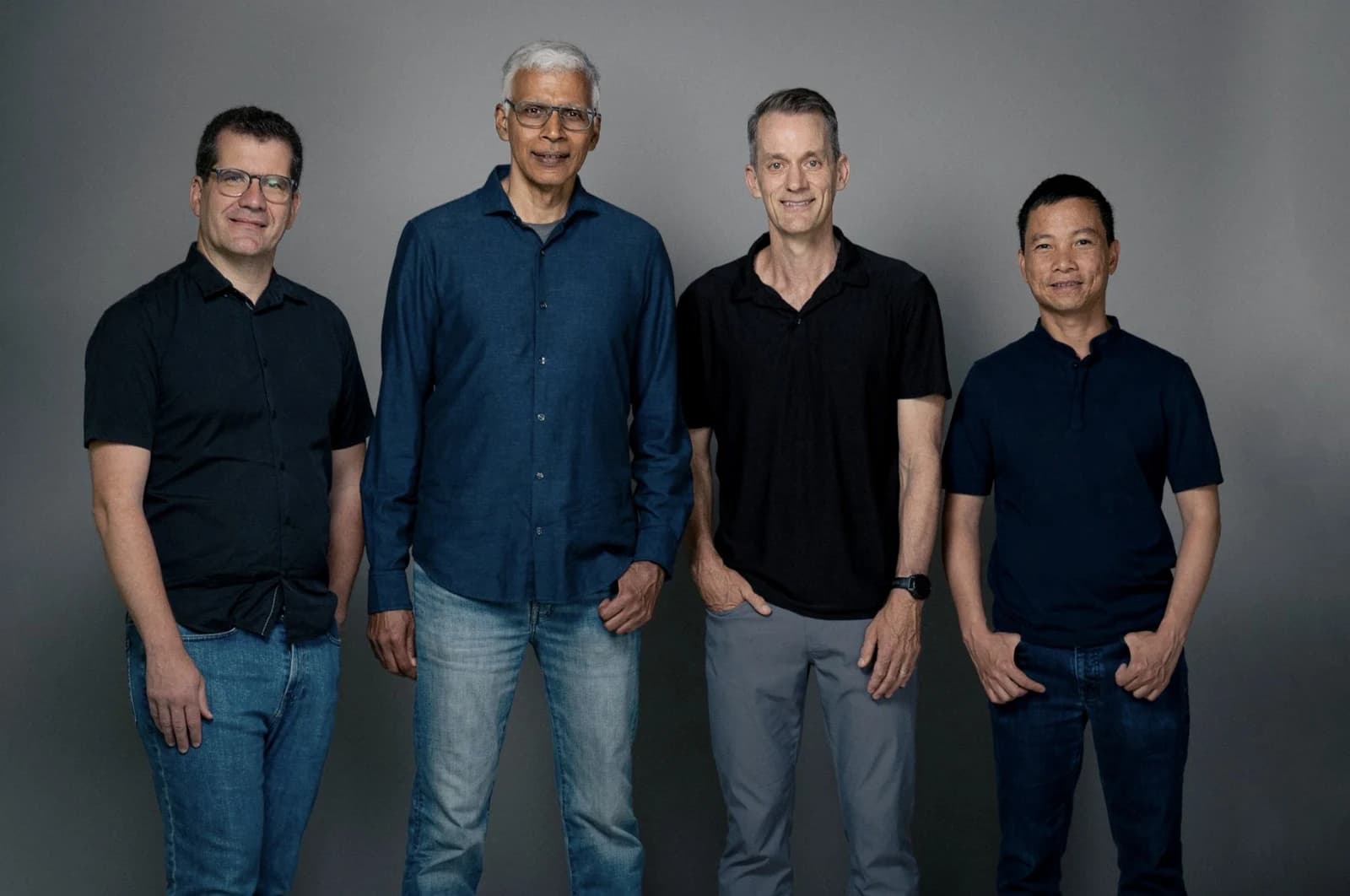 Discovery Loop founders Oriol Vinyals, Sanjay Ghemawat, Jeff Dean, and Quoc Le standing together against a gray background