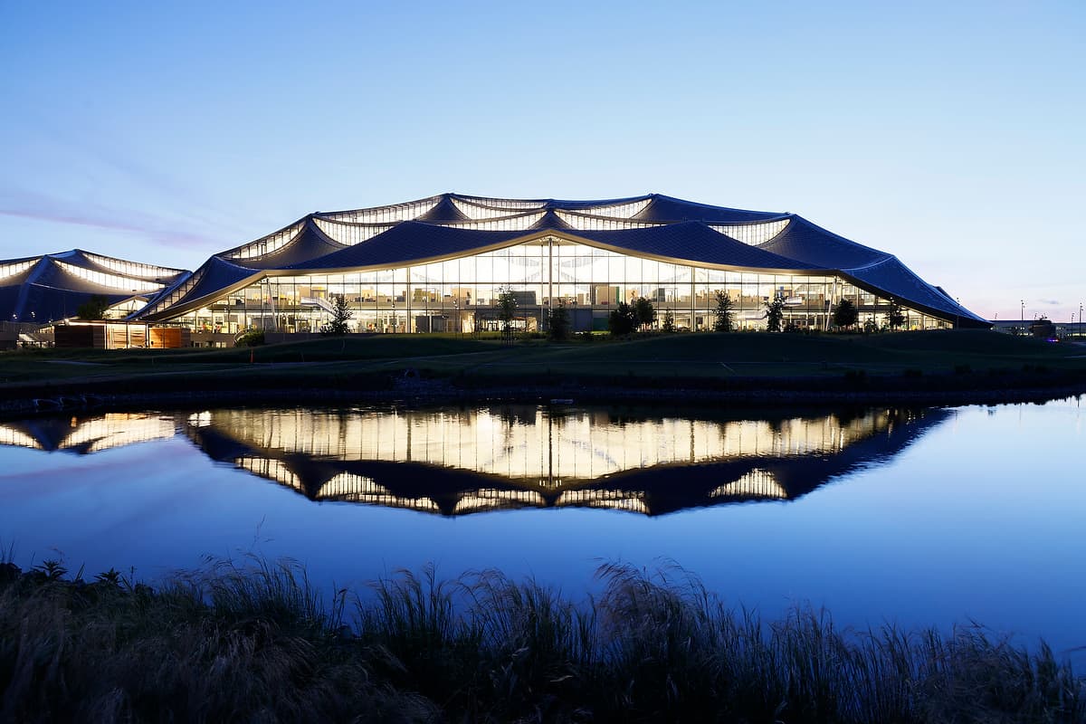 Google Bay View Campus | Modern Architecture Night Reflection - Architecture Interiors AI prompt